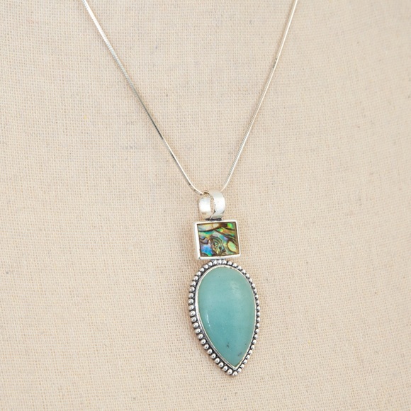 Southwestern pendant turquoise look pear stone, silver look accents Roman stamp - Picture 7 of 11
